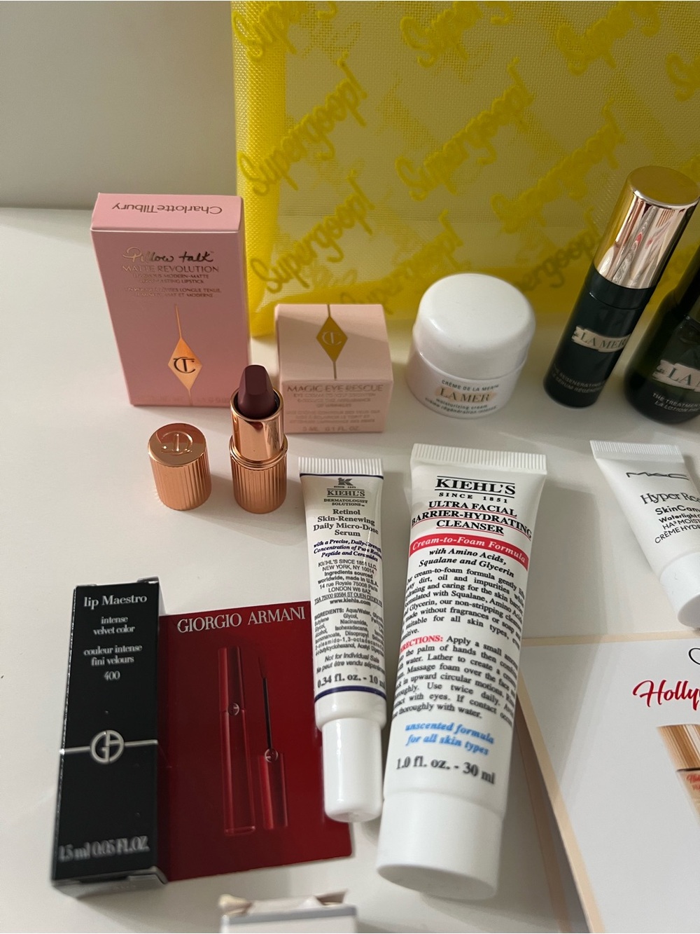 Supergoop! New Yellow Mesh Travel Pouch with mini skin care fsamples bundle. - Picture 6 of 8